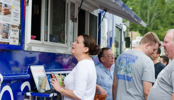 A patron orders at Baguettaboutit at Cary's 1st Town Food Truck Rodeo