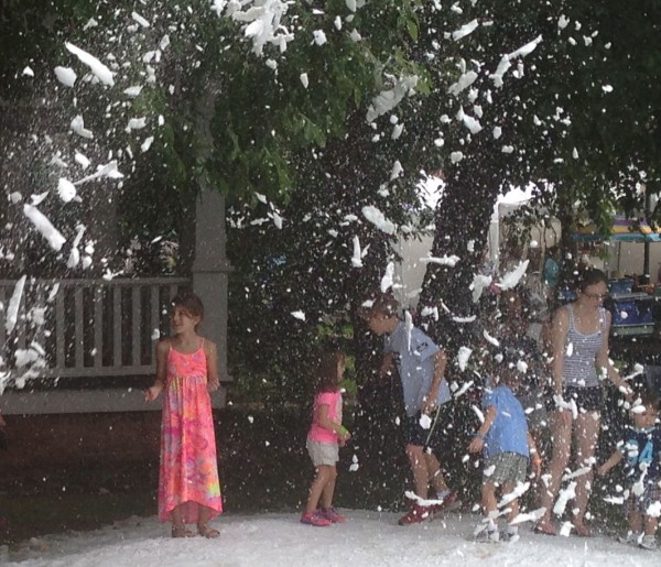 Wake County's Guardian Ad Litem, hired Snow Your Yard to make it snow at Lazy Daze