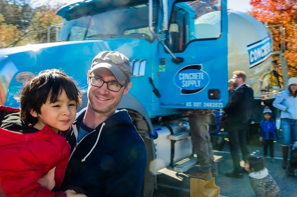 Ryan and five year old Lucas Welch took part in the Bright Horizons Truck Day by exploring the Concrete Supply mixing truck cab.