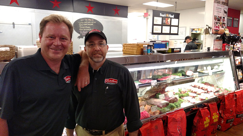 Butcher's Market owner Derek Wilkins with the Cary store's general manager, Jeff Gregory.