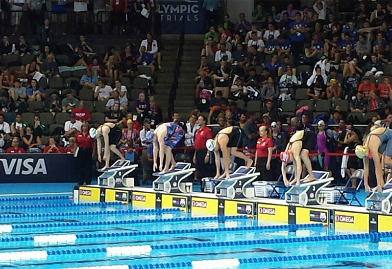 Williams in Lane 1, with the multicolored suit and YOTA cap