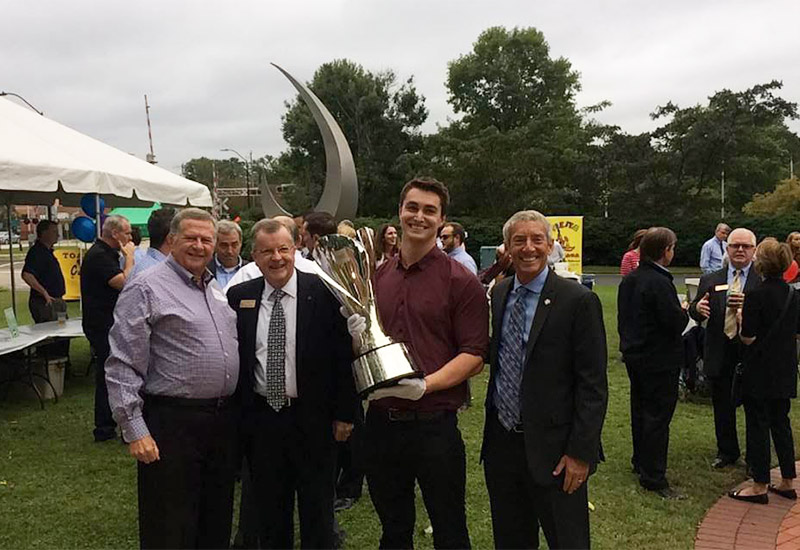 Right to left: Cary Mayor Harold Weinbrecht, Schwab Cup handler Jason, Cary Chamber President Howard Johnson and Cary Town Councilmember Jack Smith