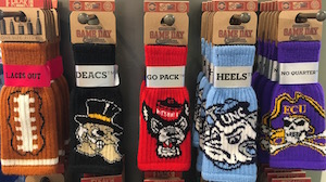 Freakers are knitted koozies that will fit any can, bottle or cup and they have all your college mascots covered, Violets, Waverly Place, $12 made in Wilmington